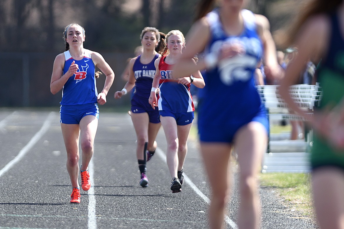 Bigfork High School's Bryn Morley distances the pack in the girls 1,600 meter run at the A.R.M. Invitational at Whitefish High School on Saturday. (Casey Kreider/Daily Inter Lake)