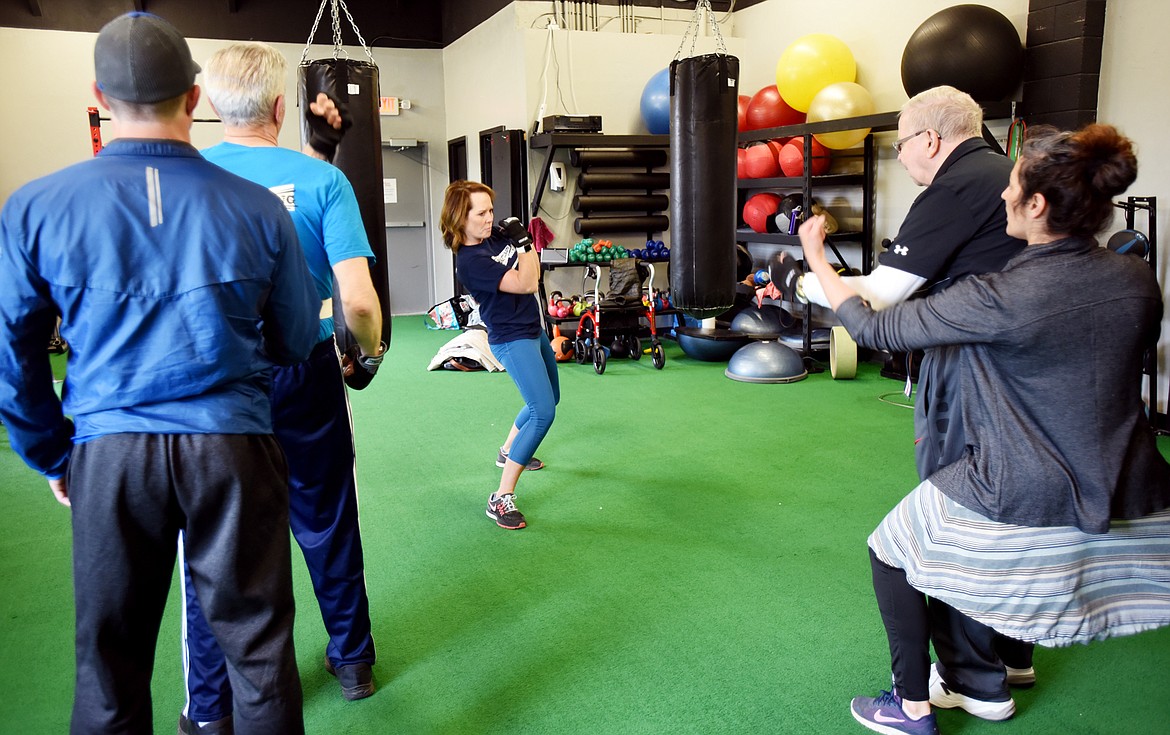 Lynnell Finley of Advanced Rehabilitation Services, LLC leads the RockSteady Boxing for Parkinson&#146;s class on Wednesday morning, April 25, at Access Fitness in Kalispell.
(Brenda Ahearn/Daily Inter Lake)