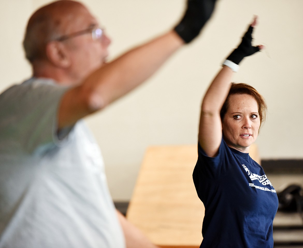 Lynnell Finley of Advanced Rehabilitation Services, LLC leads the RockSteady Boxing for Parkinson&#146;s class on Wednesday morning, April 25, at Access Fitness in Kalispell.
(Brenda Ahearn/Daily Inter Lake)