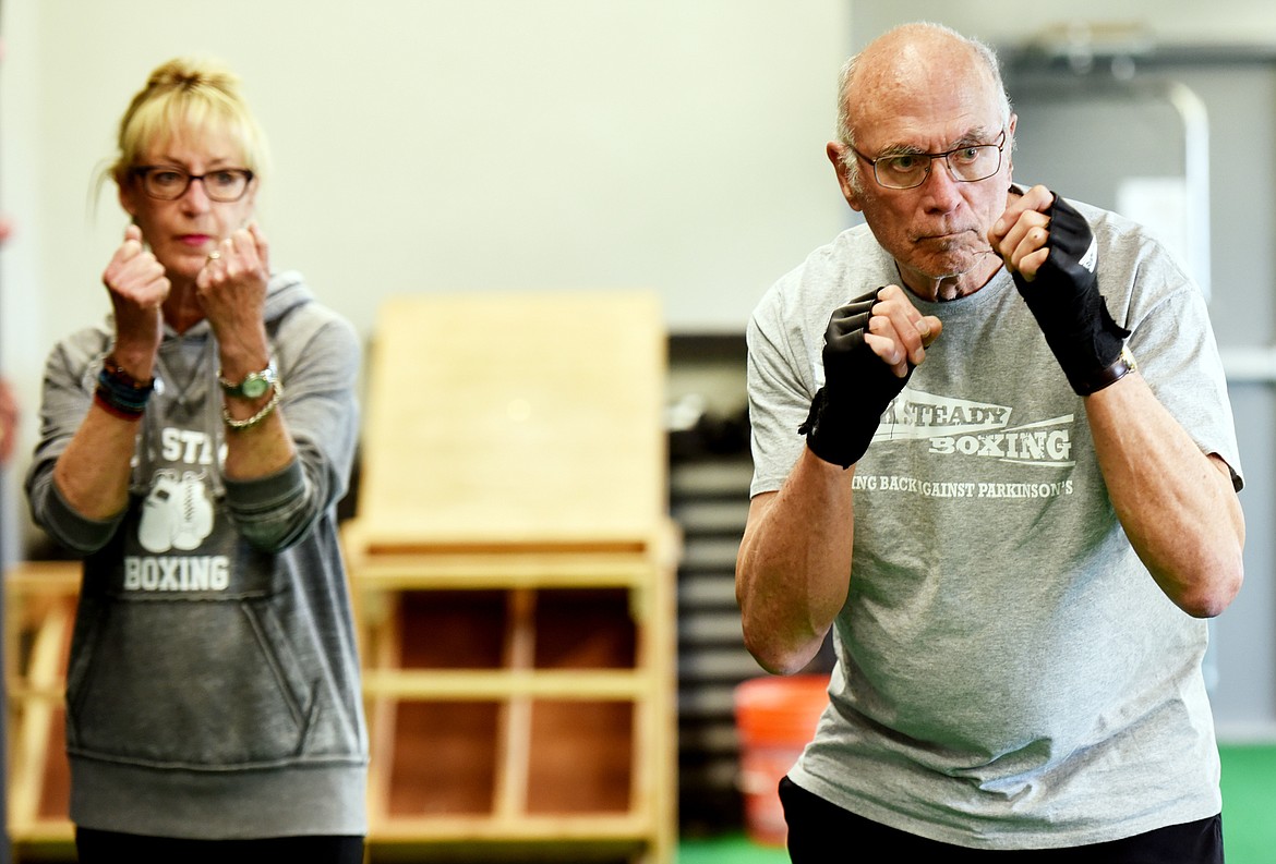 Katie Jackson and her husband Joe doing shadowboxing drills during the RockSteady Boxing for Parkinson&#146;s class on Wednesday morning, April 25, at Access Fitness in Kalispell.
(Brenda Ahearn/Daily Inter Lake)