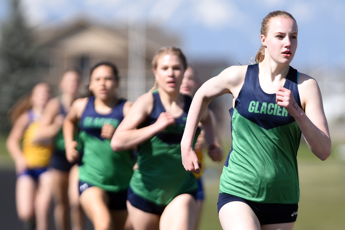 Glacier&#146;s Caroline Dye leads the pack in the girls 800 meter race during the Glacier Cinco track meet at Glacier High School on Thursday. (Casey Kreider/Daily Inter Lake)