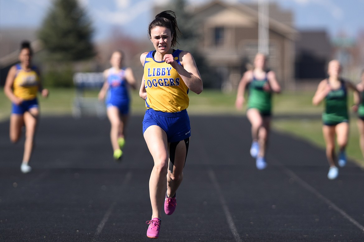 Libby&#146;s Sidney Stevenson crosses the finish line in the girls 400 meter race during the Glacier Cinco track meet at Glacier High School on Thursday. (Casey Kreider/Daily Inter Lake)