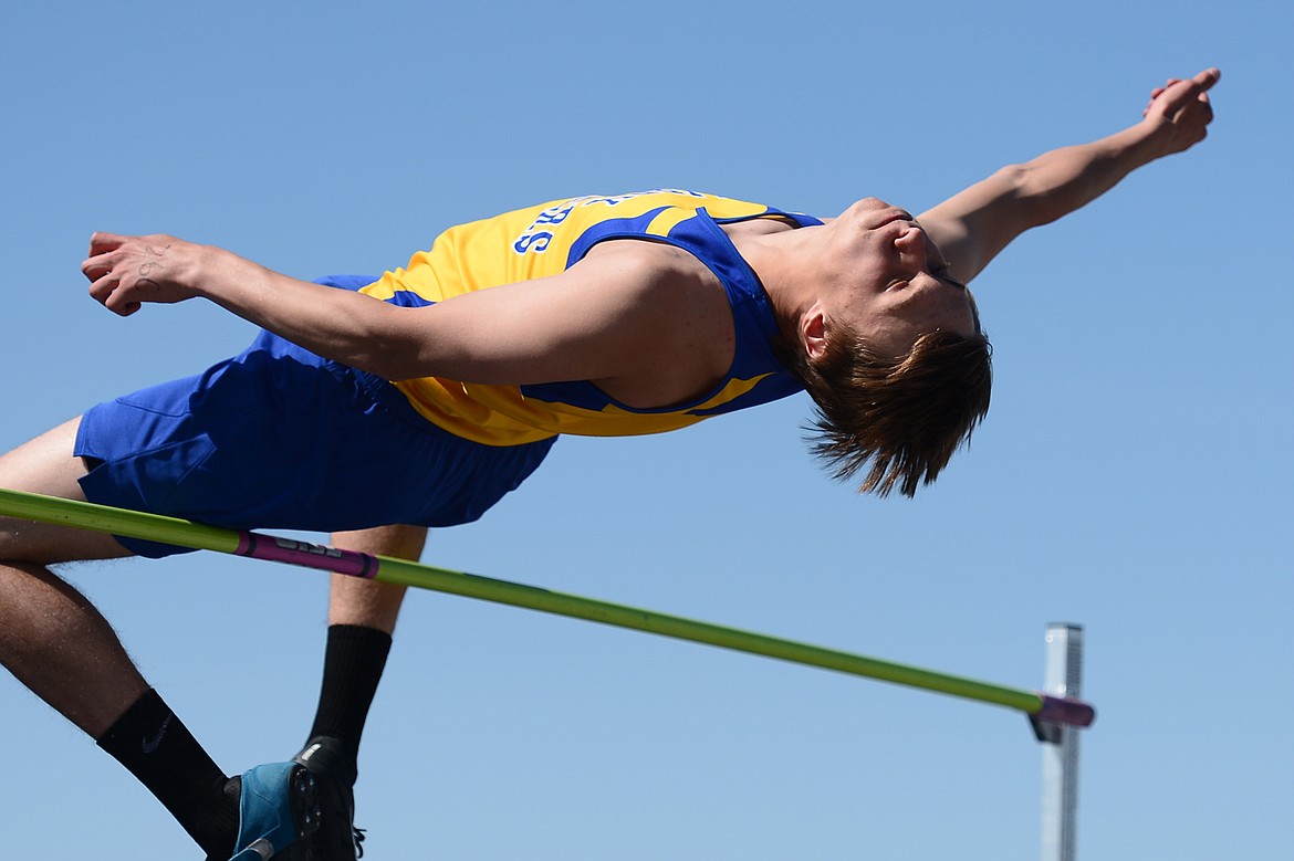 Libby&#146;s Gavin Strom attempts to clear 5&#146;9&#148; in the boys high jump at the Glacier Cinco track meet at Glacier High School on Thursday. (Casey Kreider/Daily Inter Lake)