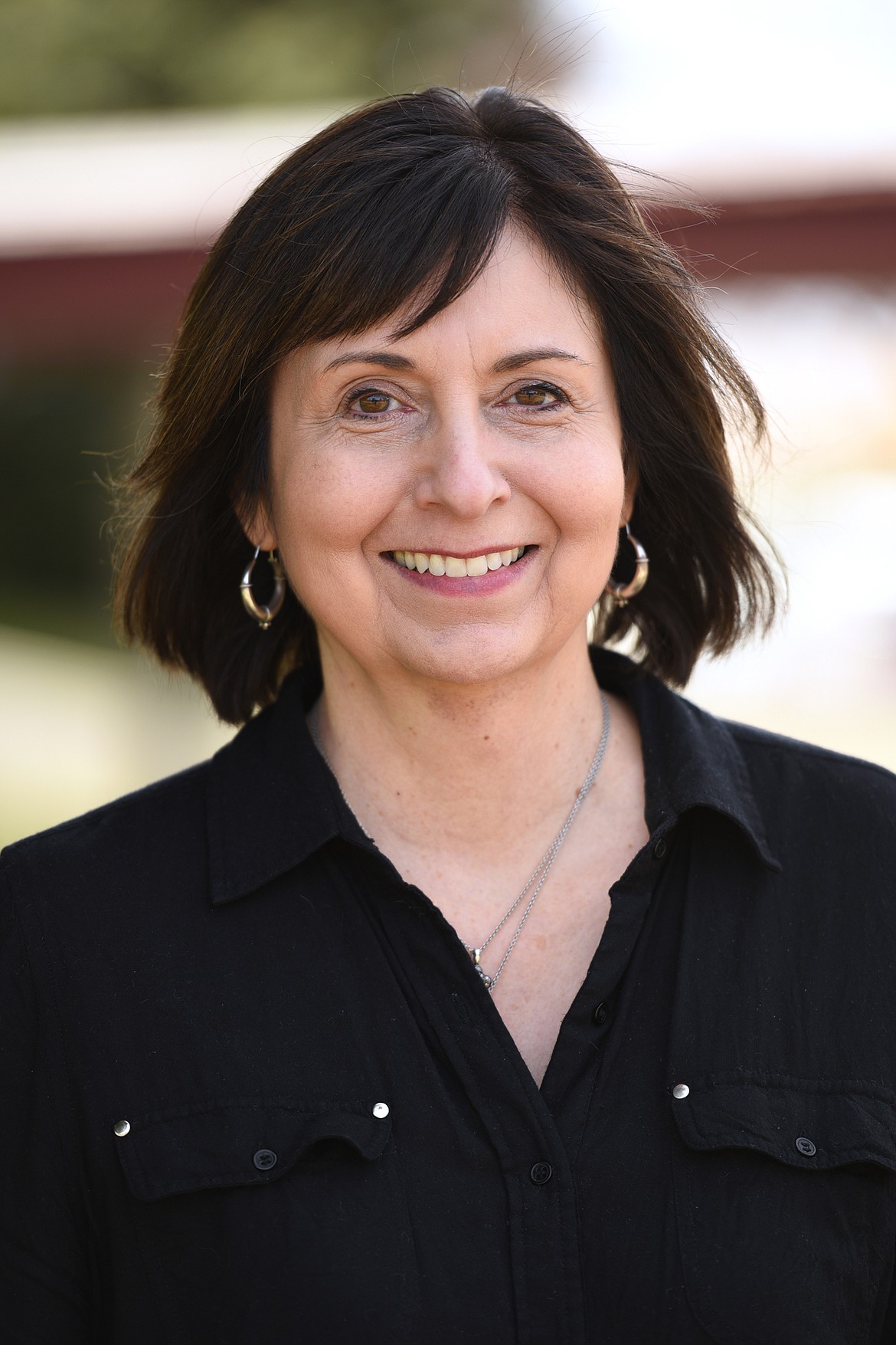 Leslie Greene, Montana American Indian program director at Flathead Valley Community College, stands outside the Learning Resource Center on April 20. (Casey Kreider/Daily Inter Lake)