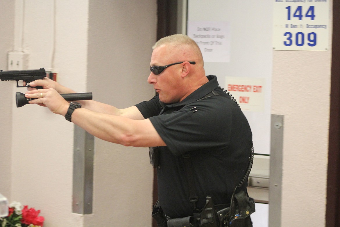 Richard Byrd/Columbia Basin Herald
Moses Lake Police Department Office Joe Frey took Wednesday&#146;s training exercise at the Columbia Basin Job Corps campus seriously and treated the exercise as if it was a real emergency situation.