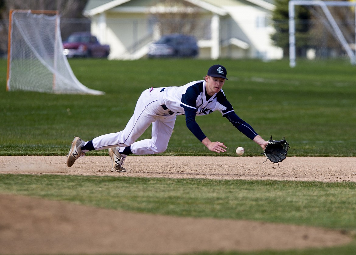 Lake City third baseman Kyle Manzardo dives for a ground ball in a game against Lewiston last Friday.