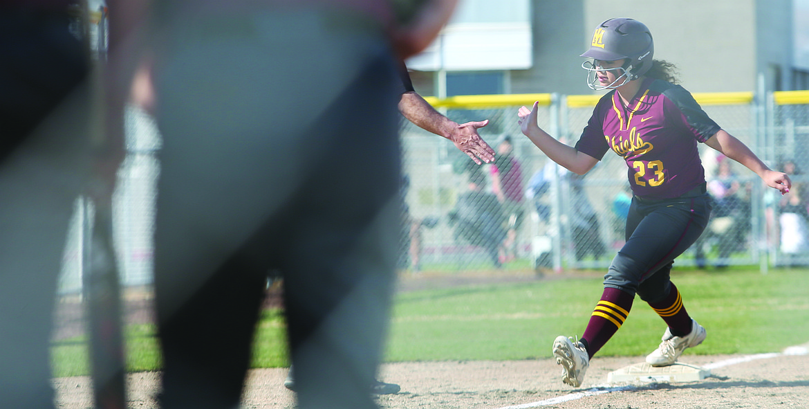 Connor Vanderweyst/Columbia Basin Herald
Moses Lake's Brooklyn Bailey rounds third base and heads home after a solo home run in the third inning.