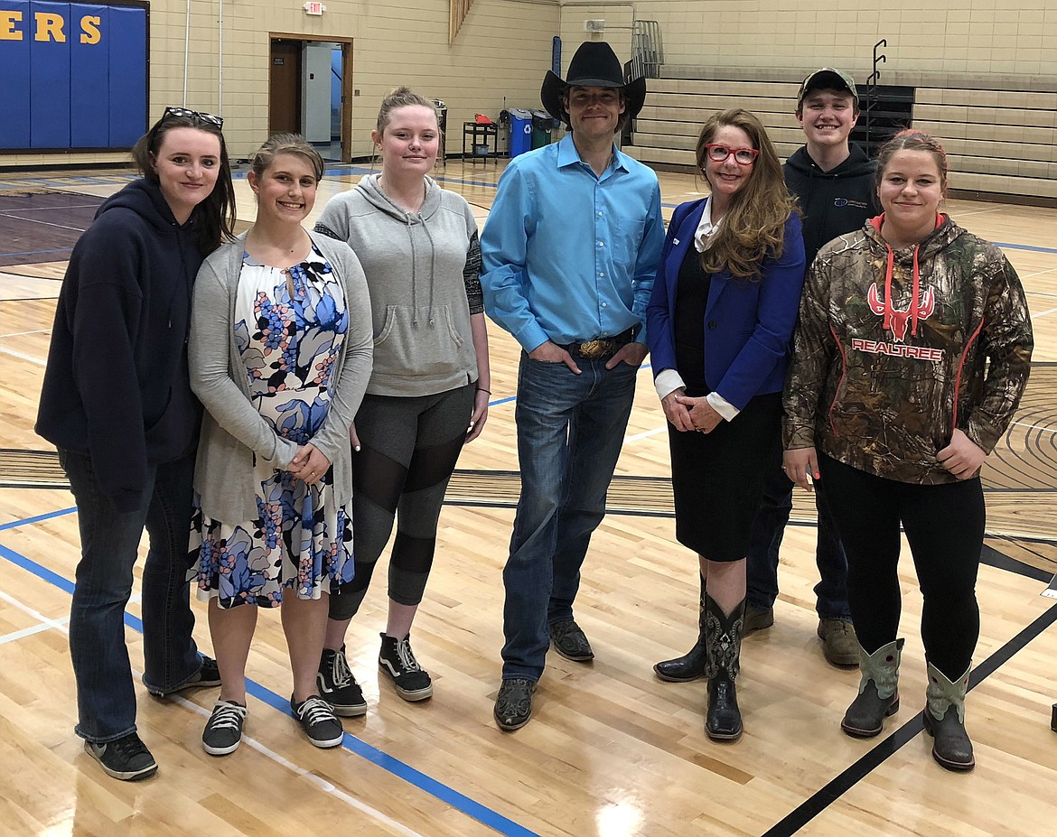 Country musician Jason DeShaw, center, and State Superintendent Elsie Arntzen, to his left, stand with Libby High School students during a stop of the Montana Schools Tour at the school on Thursday, April 20. The tour’s purpose is “to give students and educators a better understanding of mental illness, addiction and suicide,” according to a news release. The students are, from left: Brittany Browning, Ashlynn Charles, Oasis Montgomery, Austin Ihrig and Bridgett Haskins. (Courtesy photo)