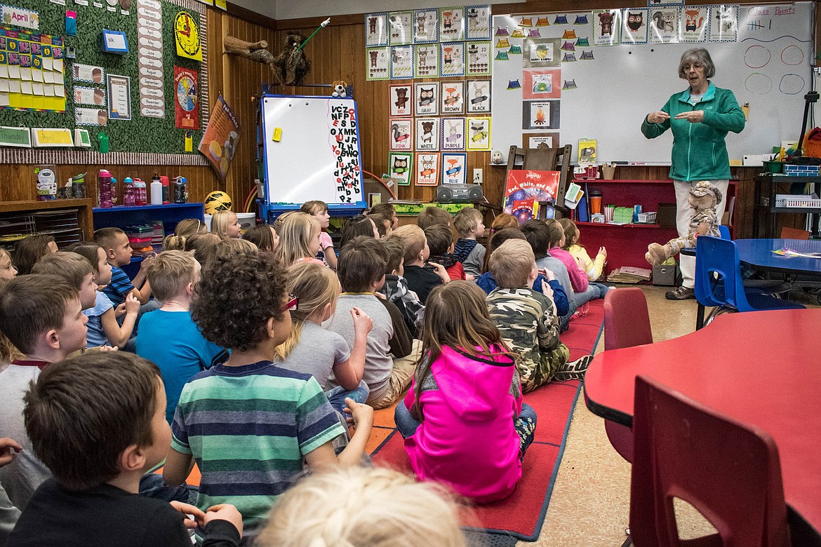 Ray Eanes teaches sign language to kindergartners at Libby Elementary School, April 12. (Ben Kibbey/The Western News)