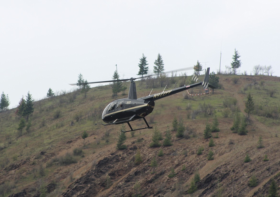 A local citizen volunteer uses their helicopter to cover more ground.