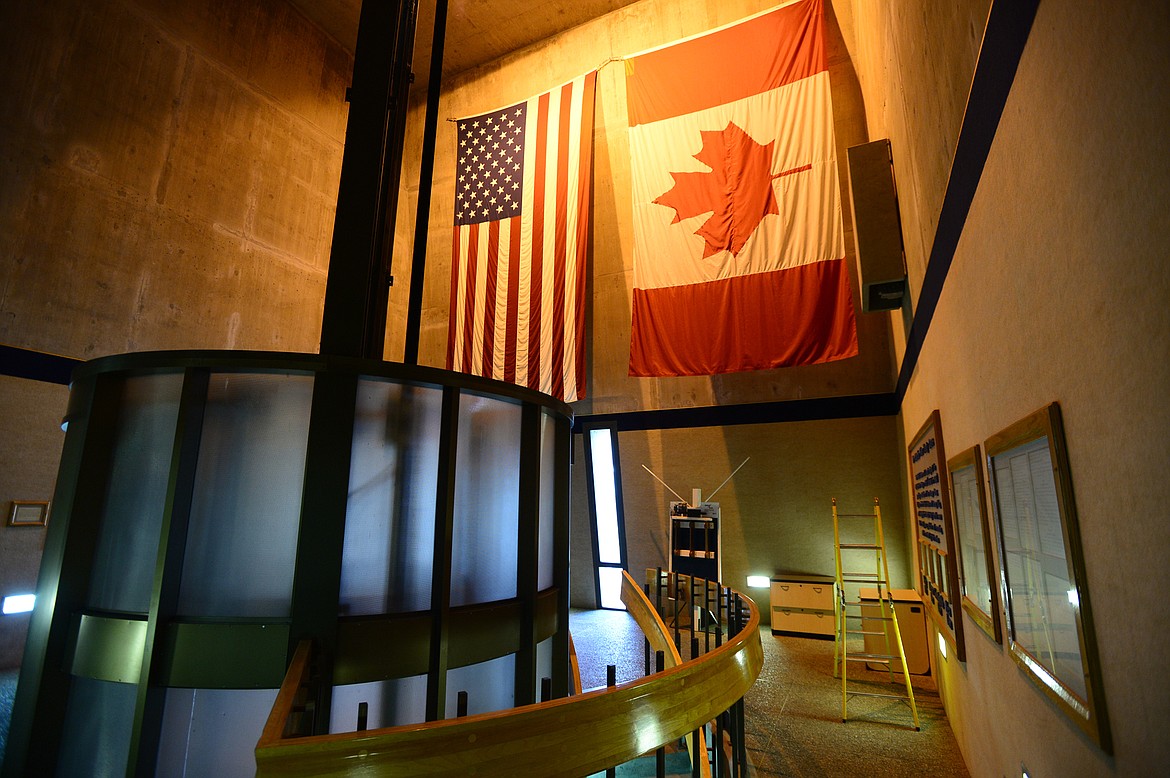 An American and Canadian flag hang inside the Treaty Tower atop the Libby Dam in Libby on Wednesday, April 18. (Casey Kreider/Daily Inter Lake)