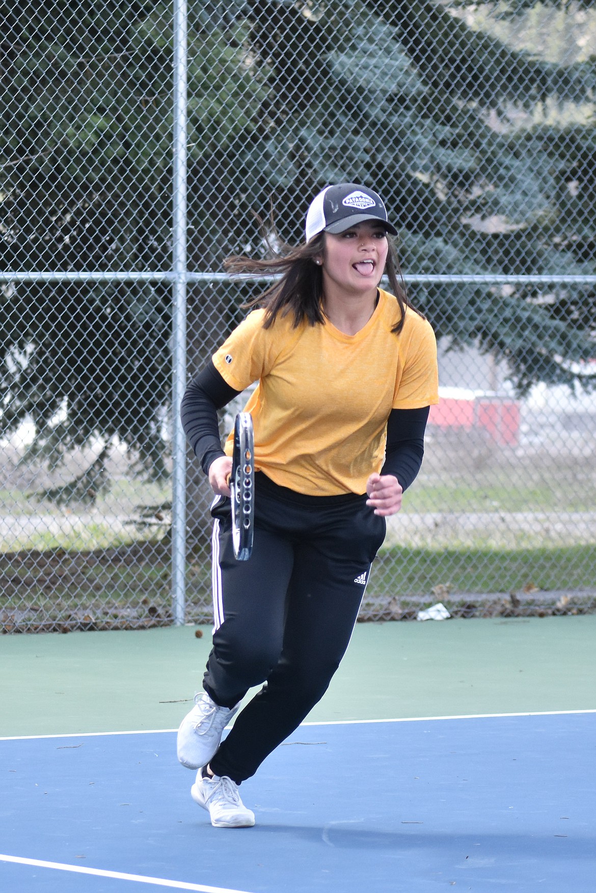 Libby&#146;s Abigail Creighton runs to the ball in her first match of the Libby Invitational, April 21, facing Bigfork&#146;s Ellie Berreth. (Ben Kibbey/The Western News)