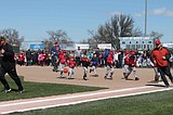 Play ball! Parade and ceremonies kick off youth sports