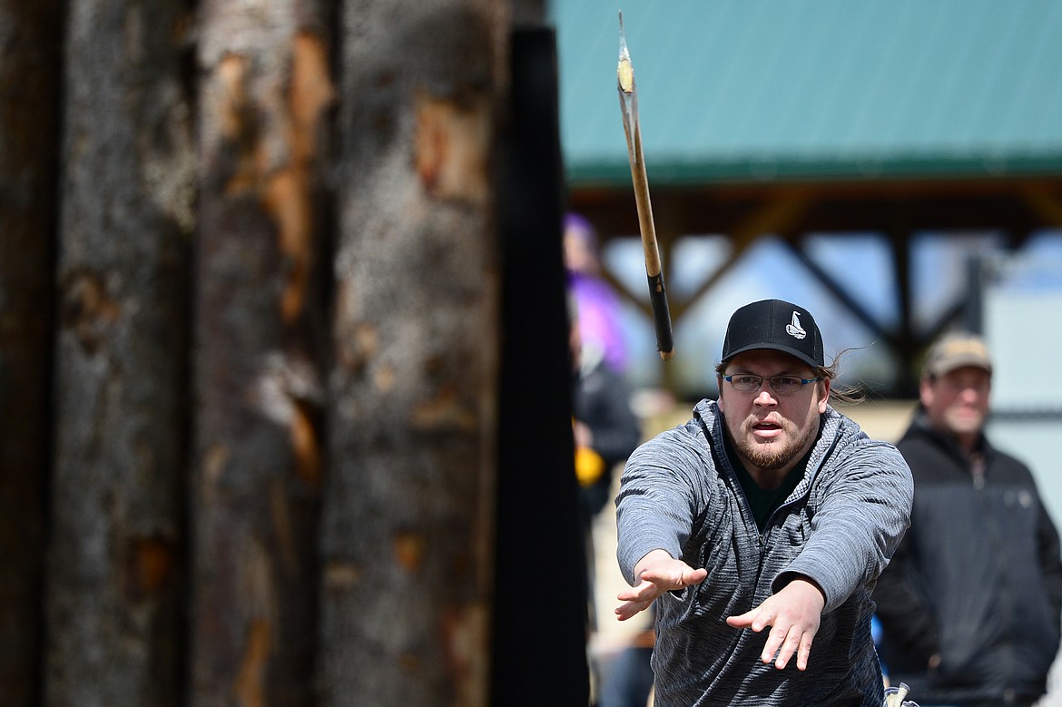 Flathead Valley Community College&#146;s Steven Raymond competes in the Axe Throw event during Stumpjumper Days at the FVCC Logger Sports Arena on Saturday.
 (Casey Kreider/Daily Inter Lake)