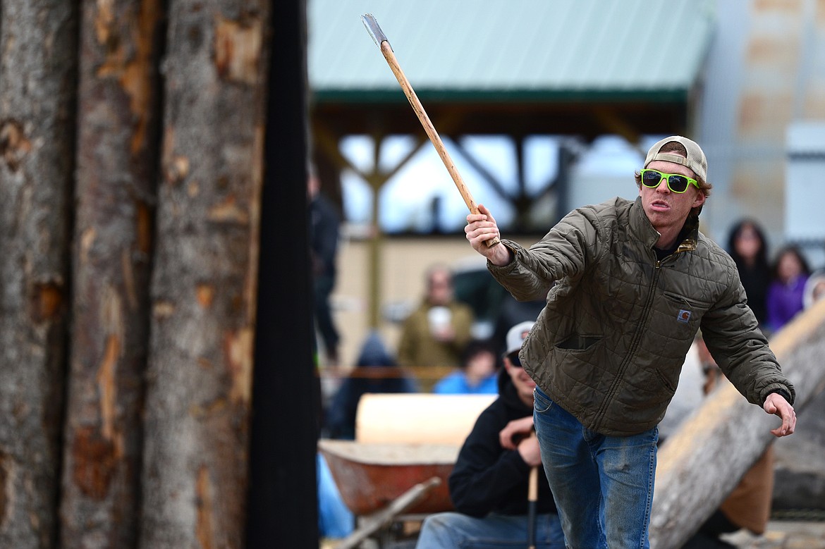 Montana State University&#146;s John Kaker competes in the Axe Throw event during Stumpjumper Days at the FVCC Logger Sports Arena on Saturday. (Casey Kreider/Daily Inter Lake)