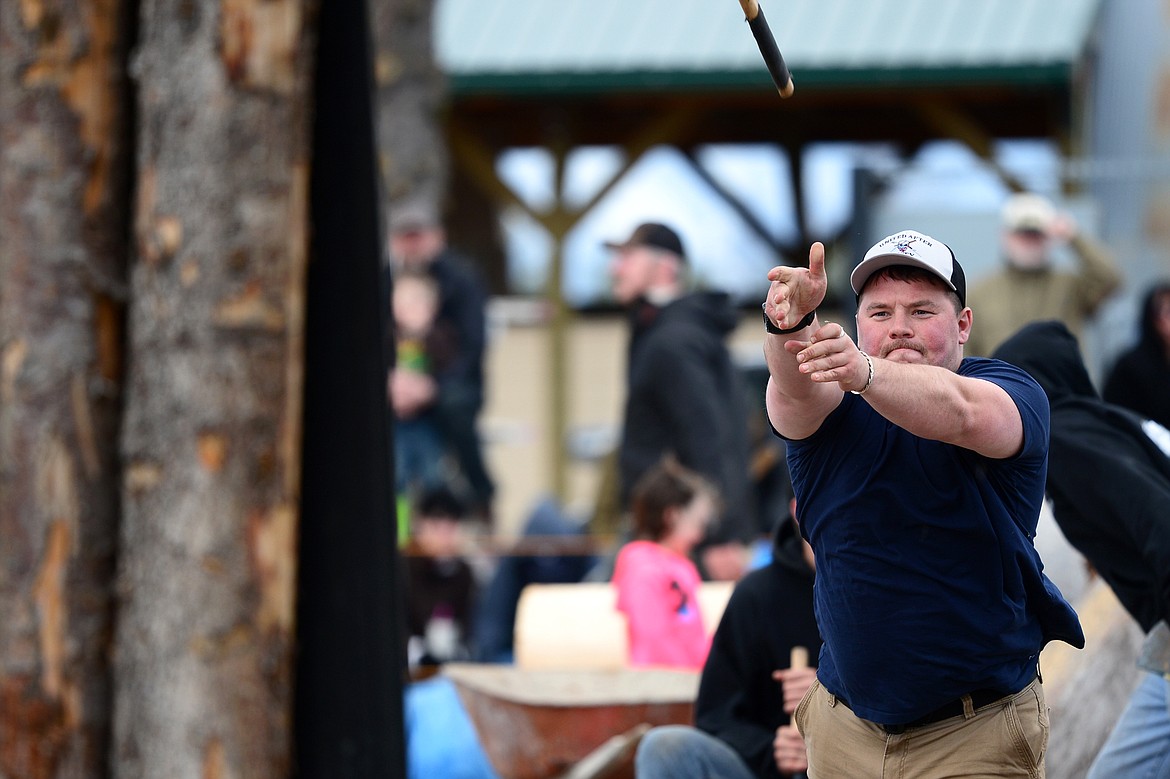 Flathead Valley Community College&#146;s Brandon Hoerling competes in the Axe Throw event during Stumpjumper Days at the FVCC Logger Sports Arena on Saturday. (Casey Kreider/Daily Inter Lake)