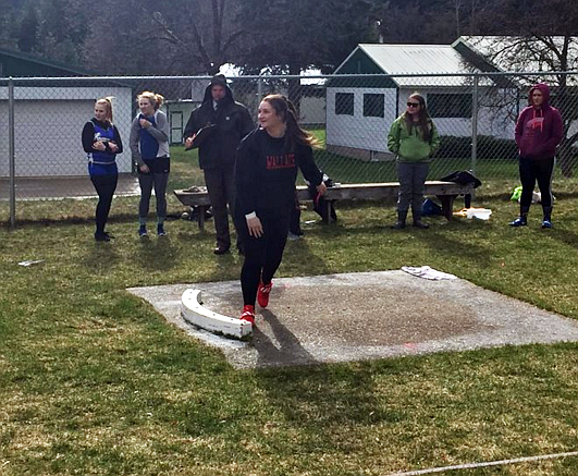 Courtesy photo 
Wallace thrower Maggie Howard admires her handiwork following a throw during a recent Wallace home meet.