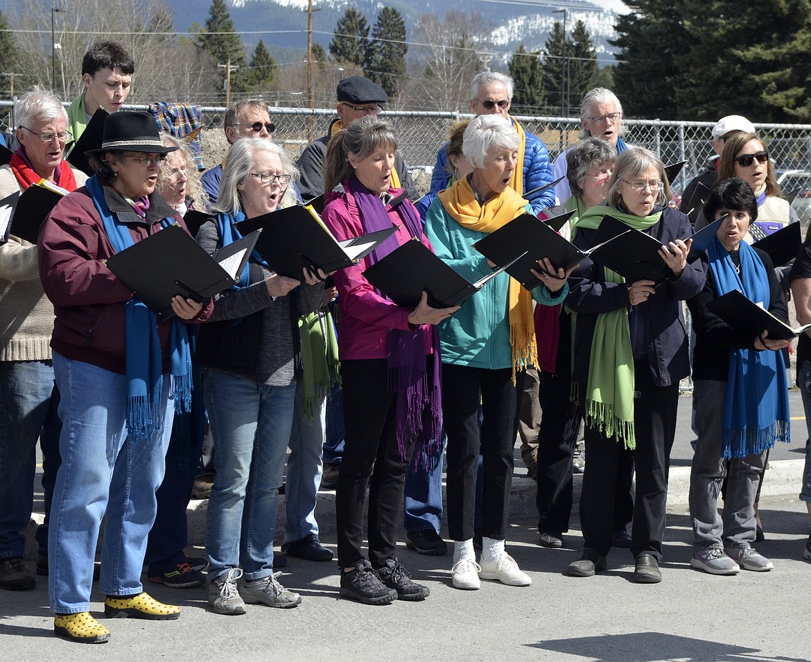 The Crown of the Continent Choir sings during the grand opening ceremony for the Center for Sustainability and Entrepreneurship Saturday during the Earth Day event. The center is adjacent to Whitefish High School. (Heidi Desch/Whitefish Pilot)