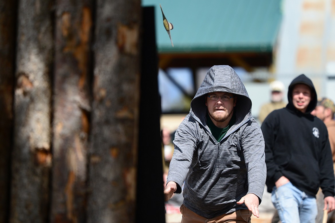 Flathead Valley Community College&#146;s Steven Raymond competes in the Axe Throw event during Stumpjumper Days at the FVCC Logger Sports Arena on Saturday. (Casey Kreider/Daily Inter Lake)