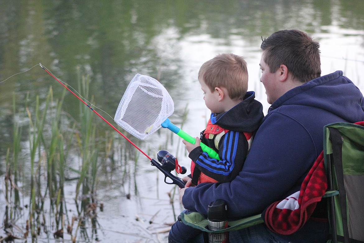 Richard Byrd/Columbia Basin Herald
Some fishing teams were a little bit younger than others and required a two-person strategy to reel in fish.