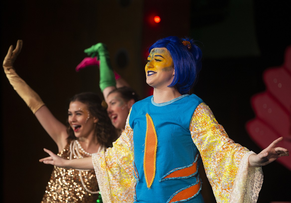 Flounder, played by Taylor Wendlikowski, rehearses a scene with the mermaid princesses during dress rehearsal for Coeur d'Alene High's production of Disney's Little Mermaid. (LOREN BENOIT/Press)