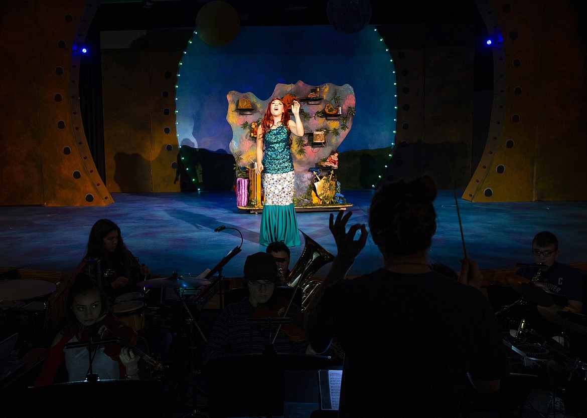 Ariel, played by Amelie Beresford-Wood, sings &quot;Part of Your World,&quot; during dress rehearsal Disney's Little Mermaid Wednesday night at Coeur d'Alene High School. (LOREN BENOIT/Press)