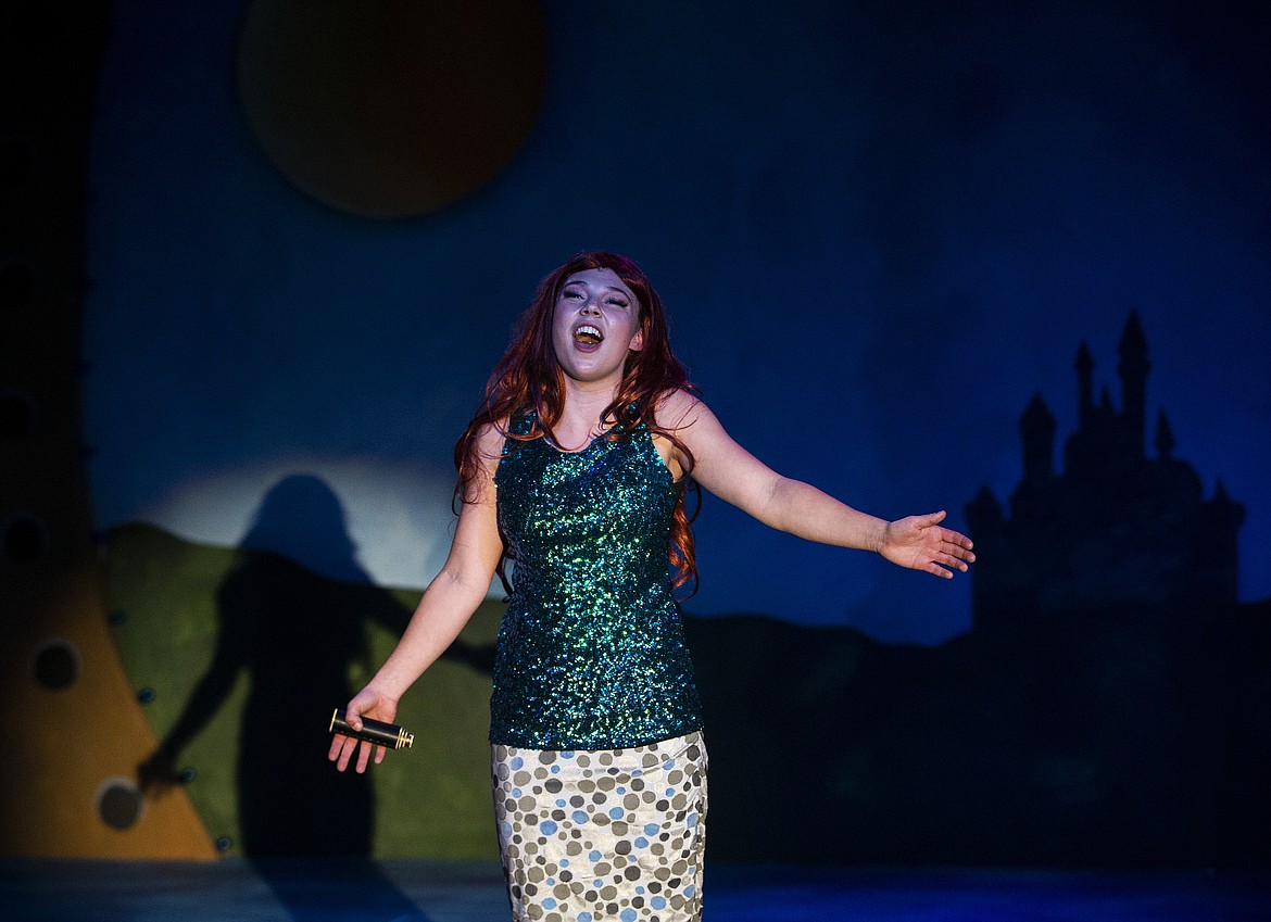 LOREN BENOIT/Press
Ariel, played by Amelie Beresford-Wood, sings a solo during dress rehearsal for Disney&#146;s The Little Mermaid Wednesday evening at Coeur d&#146;Alene High School. The play, directed by Jared A. Helm, features a mermaid who dreams of becoming human after meeting shipwrecked mariner Prince Eric. The show runs April 19, 20, 21, 26, 27, and 28 at 7 p.m. at the Coeur d&#146;Alene High School Auditorium. Visit www.chstheater.org for tickets and info.