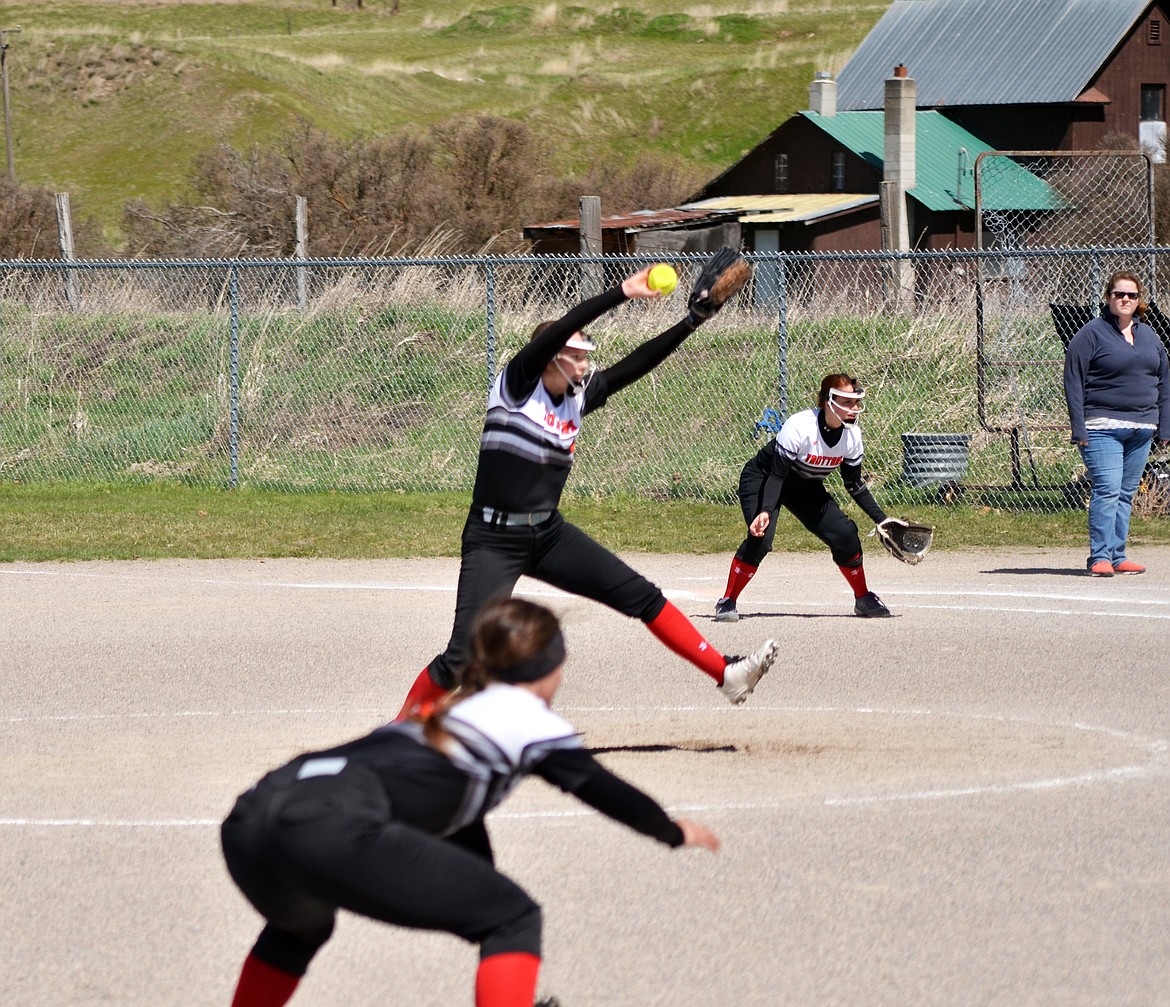 Dakota Butcher steps in to pitch during the second game frm Saturdays double header with Kassidy Kinzie on first and Sage Jackson on third (Erin Jusseaume/ Clark Fork Valley Press)