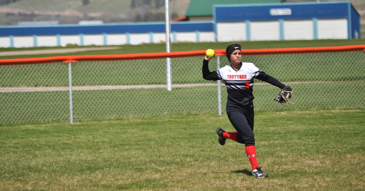 Sydney Jackson catches a fly ball into centre field to help get an out against Deer Lodge in the first game of the weekends double header (Erin Jusseaume/ Clark Fork Valley Press)