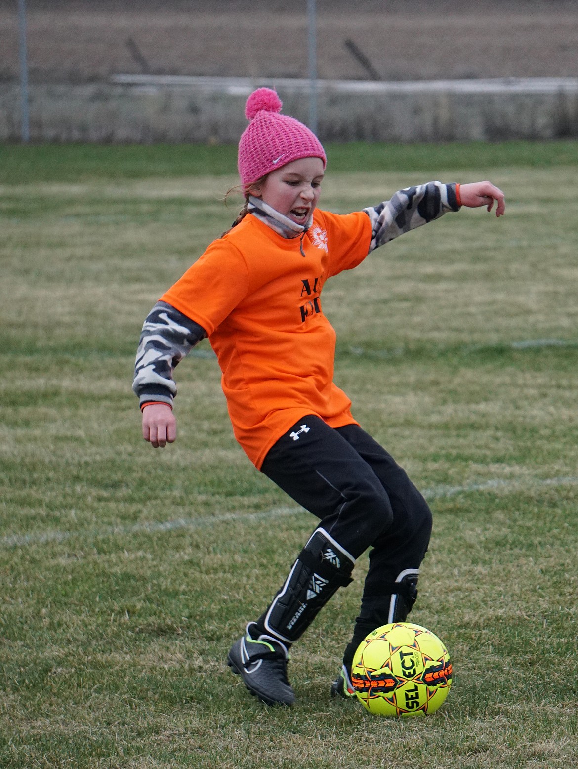 U11 girls player for the Wild Horse Plains Abby Baxter gets set to pass the ball past her opponent on the field. (photo supplied)