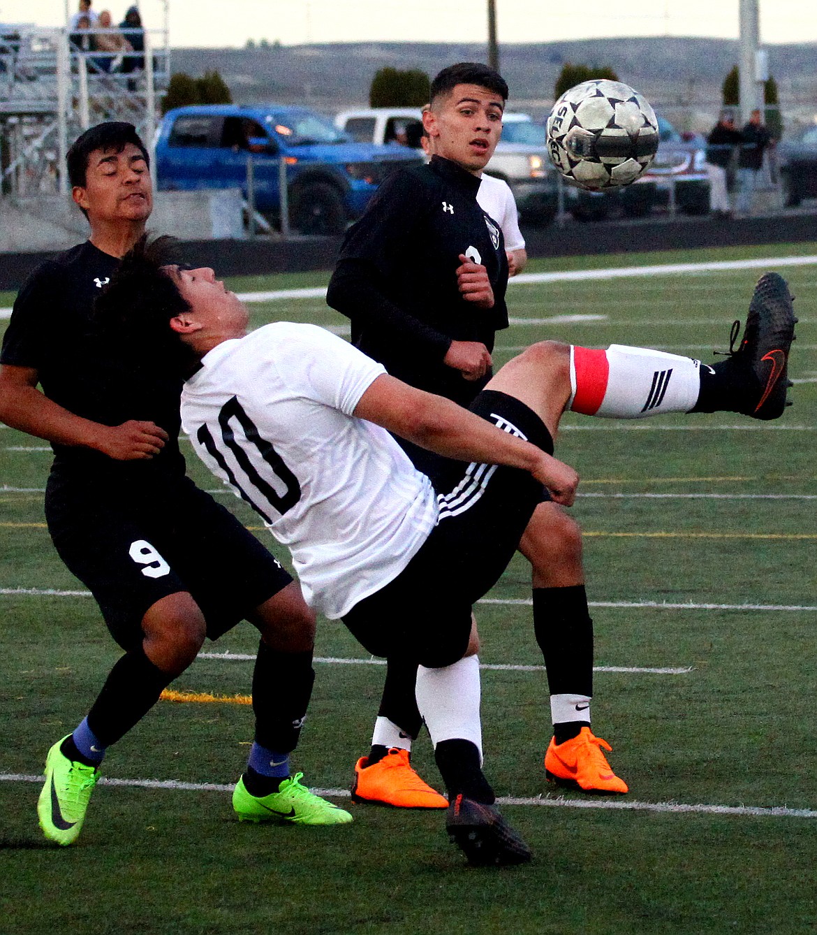 Rodney Harwood/Columbia Basin Herald
Royal midfielder Alonso Hernandez (10) takes a back-to-goal shot during the first half of Friday's SCAC East match with Wahluke.