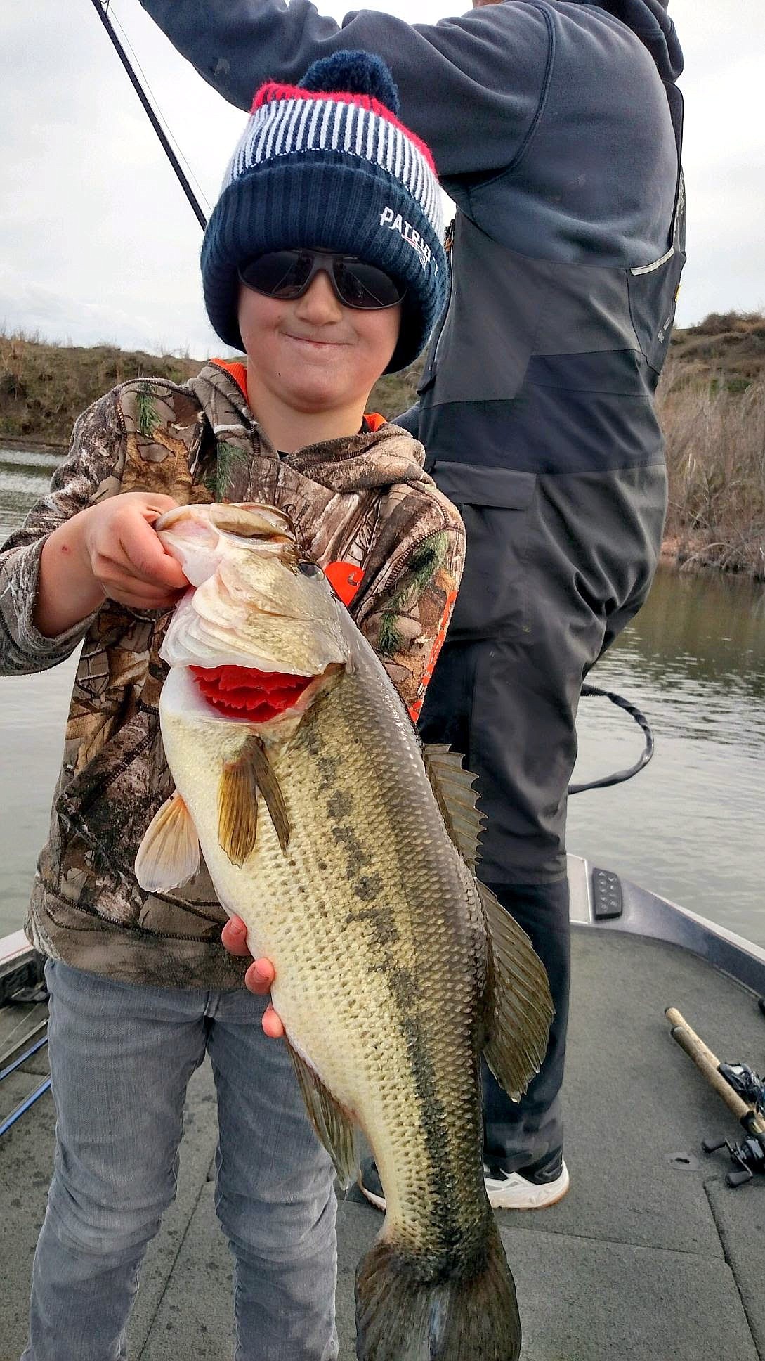 Pete Fisher photo - Mason Meseberg caught and released this 6.4 pound Largemouth bass back in the sand dunes.