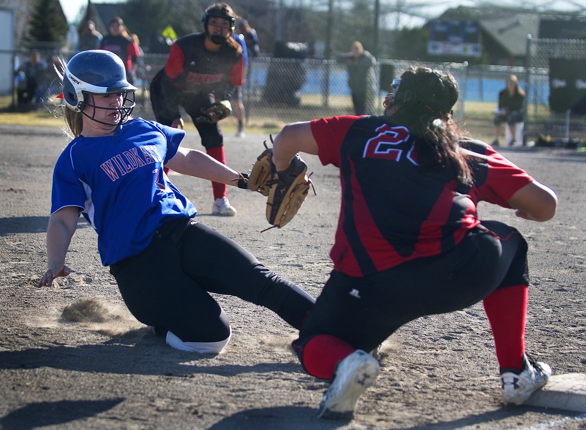 Chloe Kienas slides into third base against Browning Friday. Kienas was 1-1 against the Lady Indians.