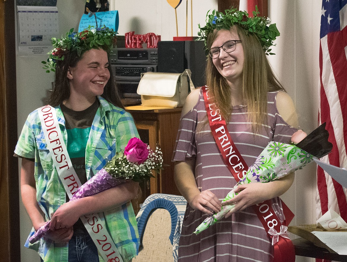 After being crowned, 2018 Nordicfest Princesses Bethany Thomas and Allie Snyder share a laugh over a comment regarding little brothers.