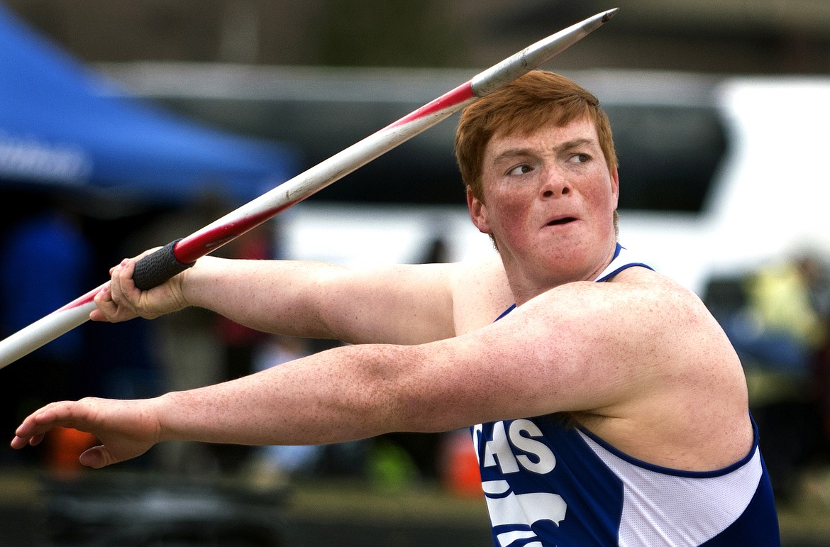 Tanner Gove throws the javelin for the Wildcats at their home meet Saturday. Gove won the event with a toss of 165 feet. (Jeremy Weber photo)