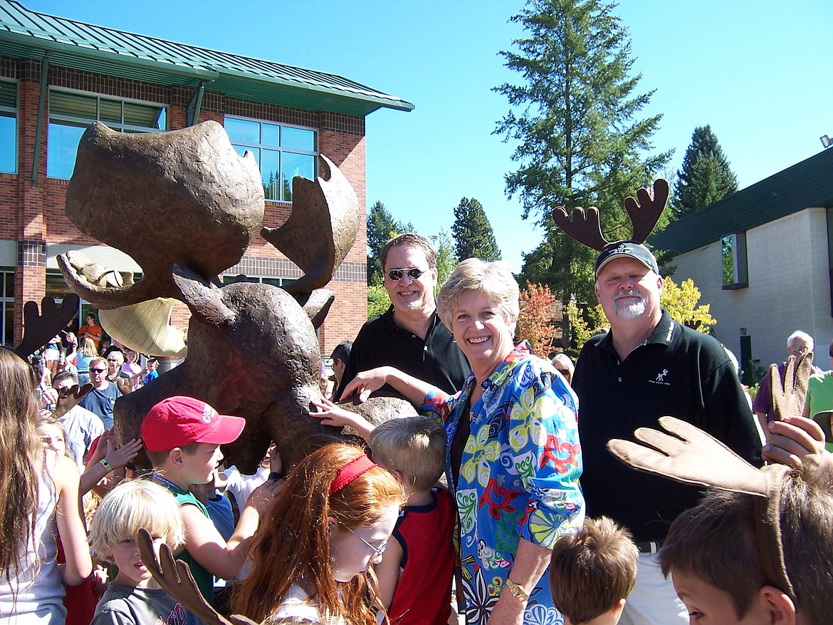 Courtesy photo
On Sept. 13, 2008, Mudgy &amp; Millie mania broke out at the Coeur d'Alene Library with the release of the first book featuring the famous moose and mouse. That's author Susan Nipp front and center, antlered sculptor Terry Lee to the right and illustrator Charles Reasoner to Nipp's left.