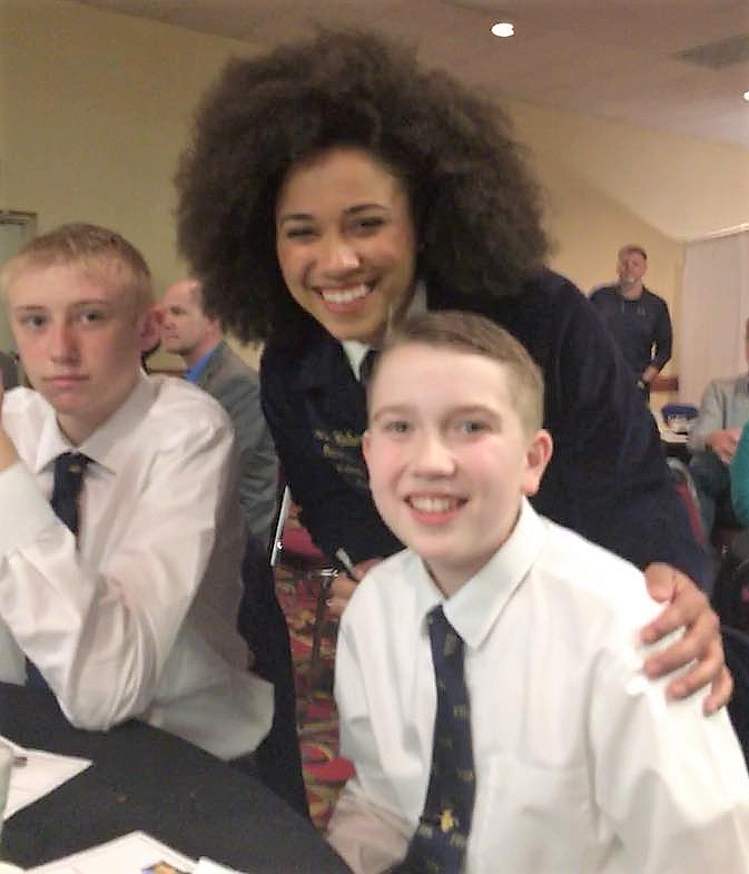 Introductions were made with FFA National President Breanna Holbert from California with St. Regis FFA members Andrew Sanford (left) and Carter Jasper (right) while in Billings. (Photo courtesy of St. Regis FFA).