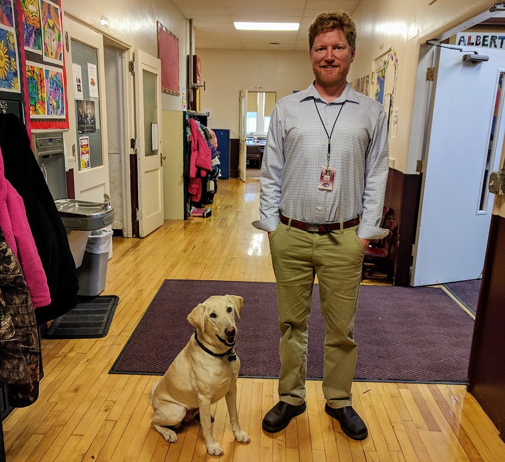 Mike Wolfe, who teachers music at Alberton School attended Wind River Tails and Trails to get his dog, Sunny, certified as a therapy dog,  (Photo courtesy of Wind River Tails and Trails).