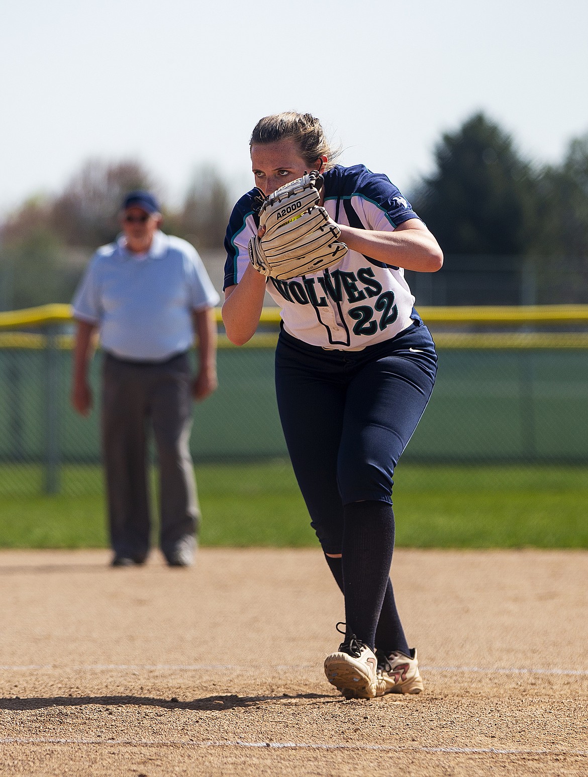 Lake City High&#146;s Amanda Curry delivers a pitch against Post Falls on Friday.