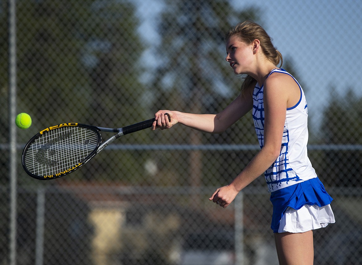 Coeur d&#146;Alene&#146;s Rachel Jeske hits a volley to Lake City&#146;s Kiki Cates in the No. 2 girls singles match Wednesday afternoon at Coeur d&#146;Alene High.