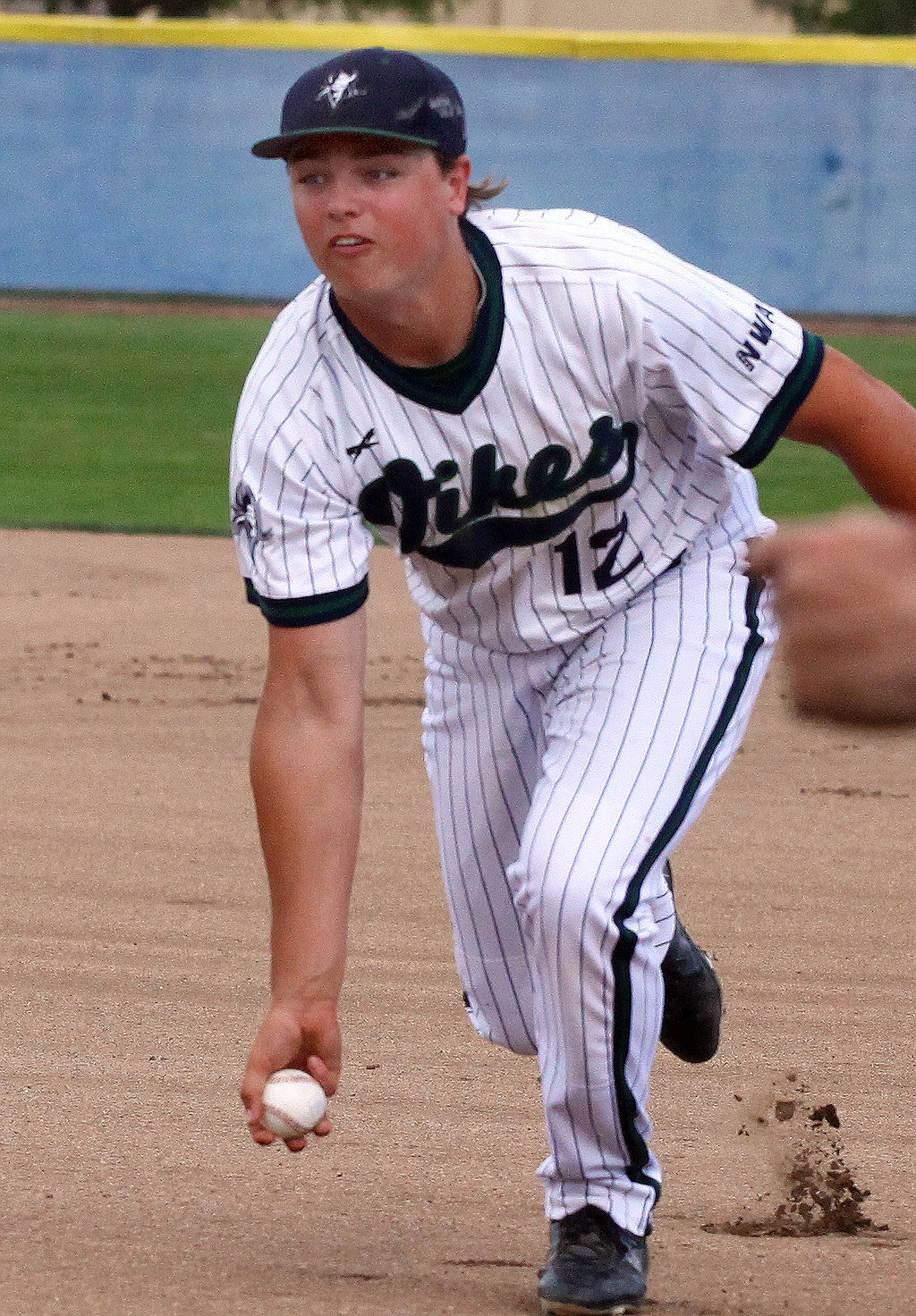 Rodney Harwood/Columbia Basin HeraldBig Bend first baseman Trevor Luckey flips the ball back to pitcher Cade Tunstall for the out during the second game of Saturday's NWAC East doubleheader with Spokane.