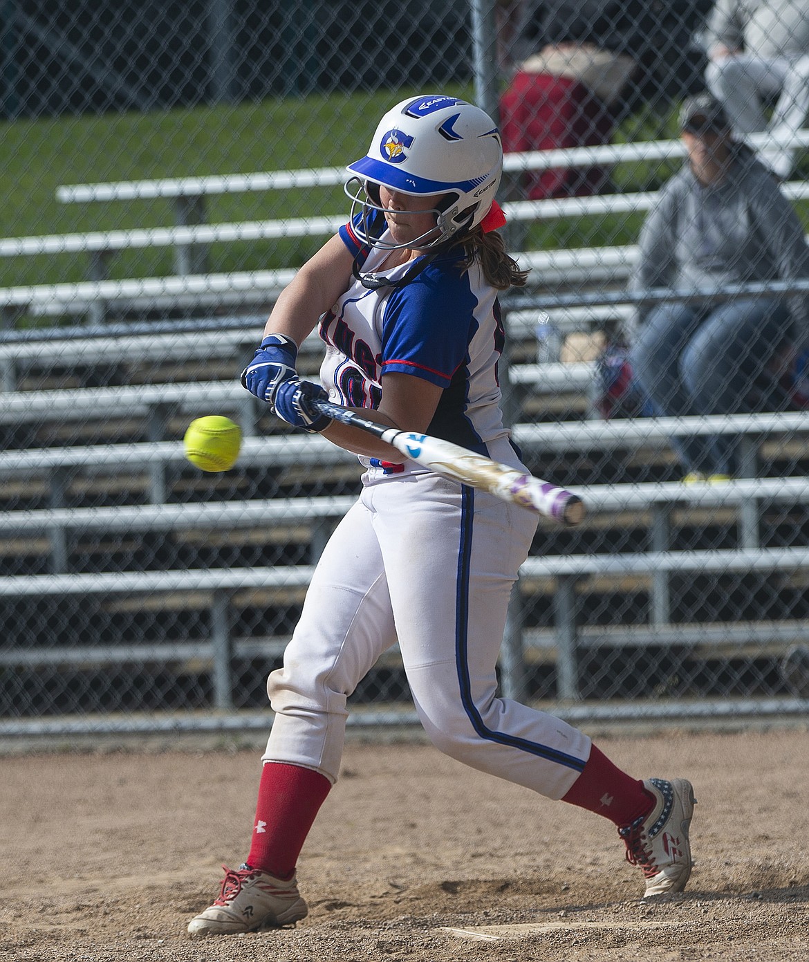 Coeur d&#146;Alene&#146;s Marilyn Comack makes contact on a pitch against Lake City.