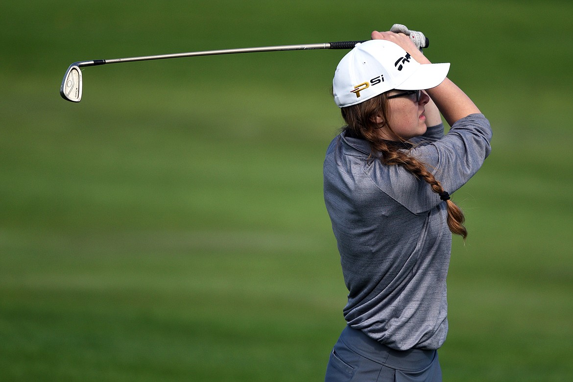 Bigfork&#146;s Hattie Emslie plays a shot from the fairway on the 2nd hole at Eagle Bend Golf Club on Tuesday. (Casey Kreider/Daily Inter Lake)