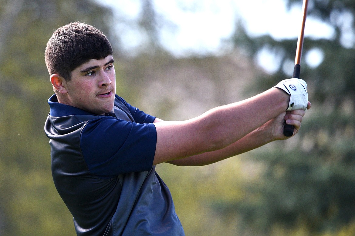 Bigfork&#146;s Chase Pacheco hits his tee shot on the 14th hole at Eagle Bend Golf Club on Tuesday. (Casey Kreider/Daily Inter Lake)