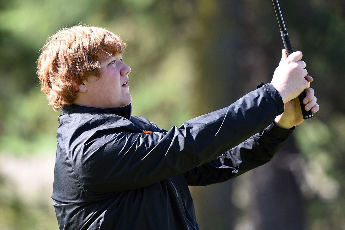 Eureka&#146;s Preston Shaw hits from the fairway on the 15th hole at Eagle Bend Golf Club on Tuesday. (Casey Kreider/Daily Inter Lake)