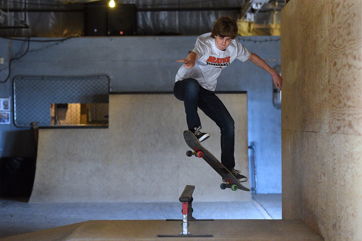 Mason Emmert, 15, ollies into a rail grind during an open skate at Serious JuJu at 707 W. Center St. in Kalispell on Friday, May 4. (Casey Kreider/Daily Inter Lake)