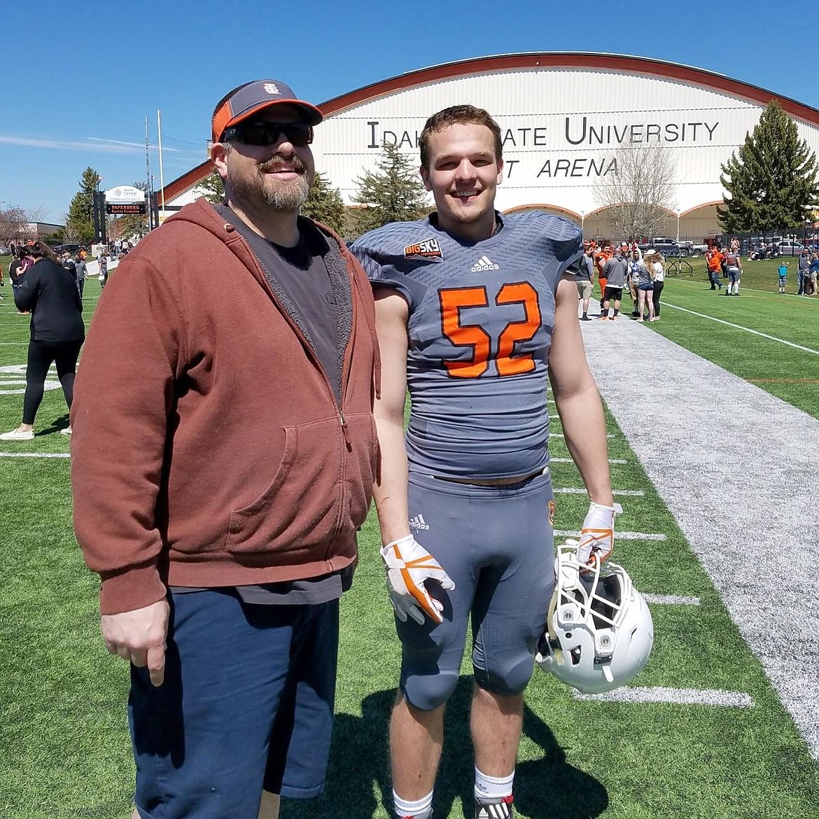 (Courtesy photo)
Former Sandpoint football standout Tyler Harris, pictured next to father Jeremy Harris, recently concluded spring football at Idaho State University. The 6-2, 215 pound sophomore outside linebacker, who sat two years before becoming the Defensive MVP last season for the Lewis Clark Loggers, is hoping to earn some playing time next fall at the inside &#147;Will&#148; linebacker spot, as well as on special teams. &#147;I was getting some reps with the twos. I think this next fall I&#146;ll be looking to get some time in on special teams. That was my focus, show that I&#146;m a decent athlete and I belong on the field somewhere,&#148; said Harris of spring practice, noting the jump to the Big Sky is a big one. &#147;Definitely a lot faster, guys are pretty strong. It&#146;s fun, it&#146;s awesome.&#148; Harris said he&#146;s looking forward to the game next year against the Vandals, and former teammates Kyle Perry and Carlos Collado. Satini Puailoa, Harris&#146; coach at Sandpoint, said things didn&#146;t work out as he was originally set to play for College of Idaho. &#147;He came back home and said &#145;coach I miss playing, what do I do?&#146;&#148; recalled Puailoa. &#147;He played at Lewis-Clark, got himself back on film, and is now a preferred walk-on at Idaho State. He&#146;ll adjust, he&#146;s athletic as heck.&#148;