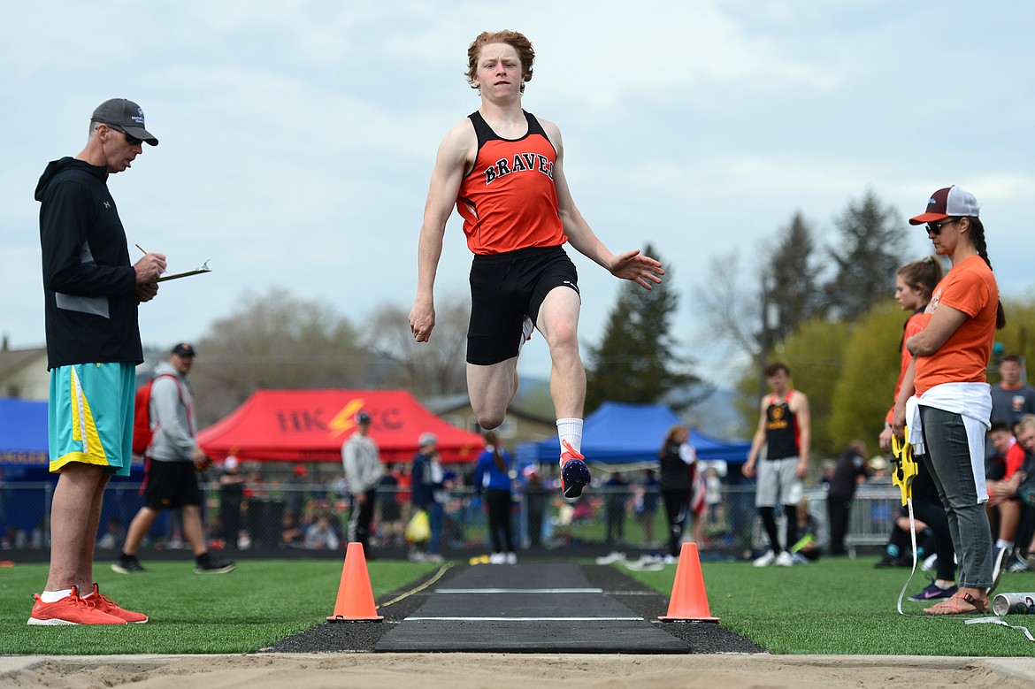 Flathead's Chance Sheldon-Allen competes in the boys long jump at the Archie Roe track and field meet at Legends Stadium on Saturday. (Casey Kreider/Daily Inter Lake)