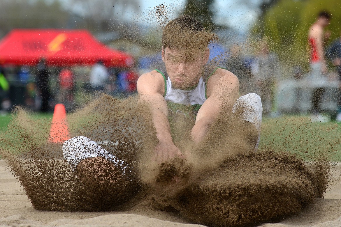 Glacier's Hunter Nicholson competes in the boys long jump at the Archie Roe track and field meet at Legends Stadium on Saturday. (Casey Kreider/Daily Inter Lake)