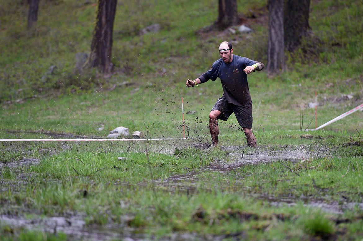 Competitors navigate the 13-mile &#147;Beast&#148; course at Spartan&#146;s Mountain Series Race in Bigfork on Saturday. (Casey Kreider/Daily Inter Lake)